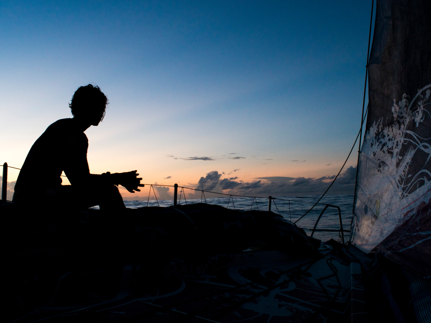 October 21, 2014.  Leg 1 onboard Team SCA. Sillhouette at sunset.
